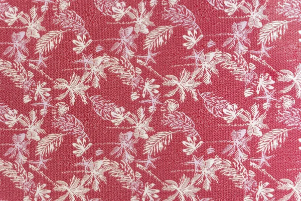 Bordo tonlarında yoğun döşeme kumaşı. Tropikal yaprak deseni ve lüreks metalik iplikleri var. Perde ya da dekor için ideal..