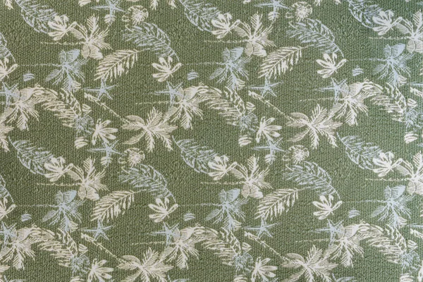 Tropikal yaprak desenli zeytin grisi kumaş desenli orta sıklet döşeme ve lureks metalik iplikler, ev dekorasyonu için ideal.