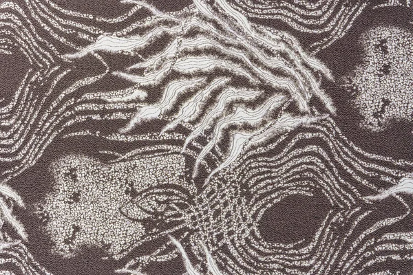 Metalik lurex iplikleri ve soyut dalga desenli dekoratif taupe jakquard kumaş yakın plan, döşeme, perdeler ve yastıklar için ideal