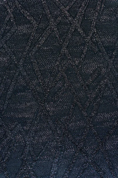 Kabartmalı, kadifemsi bir arka plan ve geometrik deseni var. Siyah bir taban, siyah ve gümüş kayganlaştırıcı ile kesişen çizgiler artı metalik noktalarla tamamlanır. Döşeme ve modern tasarım için kullan.