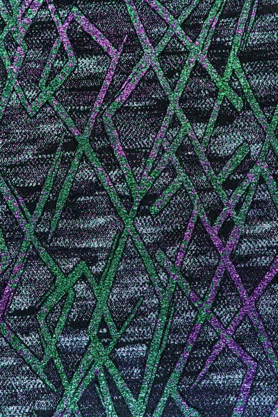 Kaotik geometrik desenli dokulu bir arka plan. Siyah bir taban parlak yeşil ve mor lurex ile kesişen çizgilerle tamamlanır ve parlak bir neon kontrastı yaratır. Döşeme için kullan