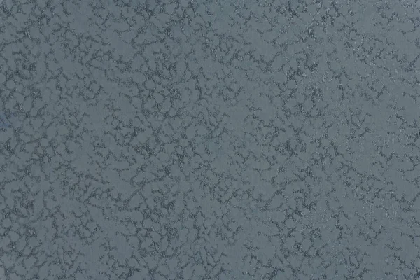 Yoğun bir tekstil yüzeyine yakın çekim. Metalik kayganlaştırıcı ile vurgulanmış dokuma yığını ipliklerinin oluşturduğu soyut çatırtılı bir desen. Koyu renk mobilya ya da duvar dekoru için arka plan