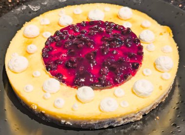 Blueberry Cheesecake with Whipped Cream Garnish