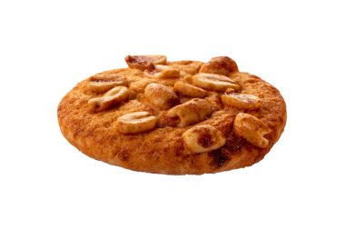 Fıstıklı yuvarlak kurabiyeler ve beyaz arka planda izole edilmiş yanmış karamel. Desing için.