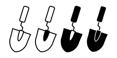 Siyah mala demeti, ekim ve toprak işlerinde kullanılan küçük el aletlerini gösteriyor. Ev bahçesi görselleri ve peyzaj tasarımları için uygun.