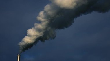 4K 59.94fps Industrial Chimney White Smoke/Steam Plume Against Dark Sky
