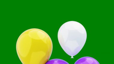 Yeşil arka planda renkli balonlar.