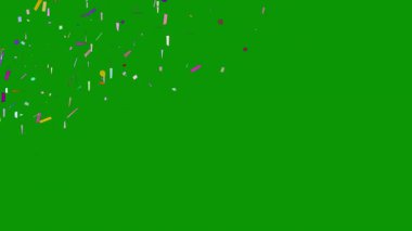Renkli konfeti, yeşil bir arka plan. şenlikli soyut arkaplan.