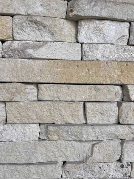 Yığılmış Açık Tan ve Bej Taş Duvar dokusu