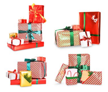 Beyaz arka planda izole edilmiş kurdele ve fiyonklarla renkli kağıtlara sarılı güzel Noel hediye kutuları. Yüksek kalite fotoğraf