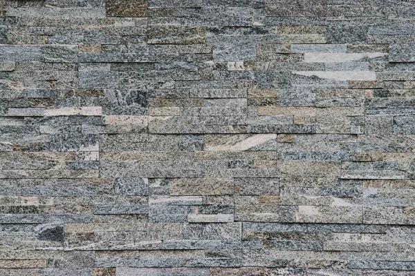 İnce kesilmiş taş duvar yığını