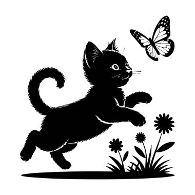 Kedi yavrusu kelebek siluetiyle oynuyor.
