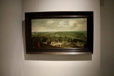 Bir saray müzesi koleksiyonundan geleneksel bir Hollanda manzara resmi. Ayrıntılı fırça çalışması klasik sanatsal tarzda kırsal manzarayı gösteriyor.