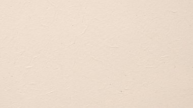 Tasarım projeleri, sunumlar ve yaratıcı düzenler için çok yönlü bir arka plan olarak pürüzsüz sıcak bej dokusu.