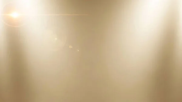 Tasarım projeleri için sıcak ışıklandırma ve ince desen içeren yumuşak altın soyut arkaplan