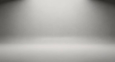 Minimum boş stüdyo sahnesi yumuşak gri ölçekli ışıklandırmayla yıkanarak ürün veya konsept fotoğrafçılık için sakin bir profesyonel zemin oluşturdu..
