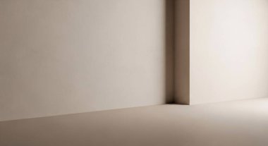 Yumuşak ışıklandırılmış, yumuşak duvarları ve yerde sıcak gölgeleri olan modern bir odanın boş bir köşesi.