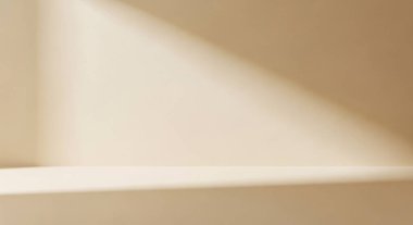 Minimal abstract interior featuring soft light and shadow on a beige wall