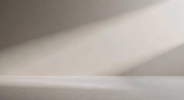 Çapraz ışık demetlerinin pürüzsüz gri bir yüzey boyunca uzandığı asgari soyut bir arkaplan tasarım ve markalaşma için sakin modern doku yaratır..