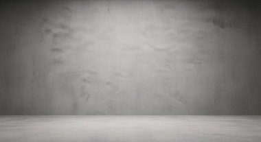A simple grayscale studio backdrop with a smooth wall and flat floor creating a clean versatile space for product or portrait shoots