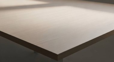 Pürüzsüz gri bir yüzeyi ve keskin gölgesi olan metalik bir platformun kenarını kapatın ve en az miktarda soyut bileşim oluşturun..