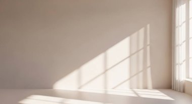 A minimal sunlit empty room with large windows casting geometric shadows on the white floor and walls, creating a calm modern interior atmosphere.