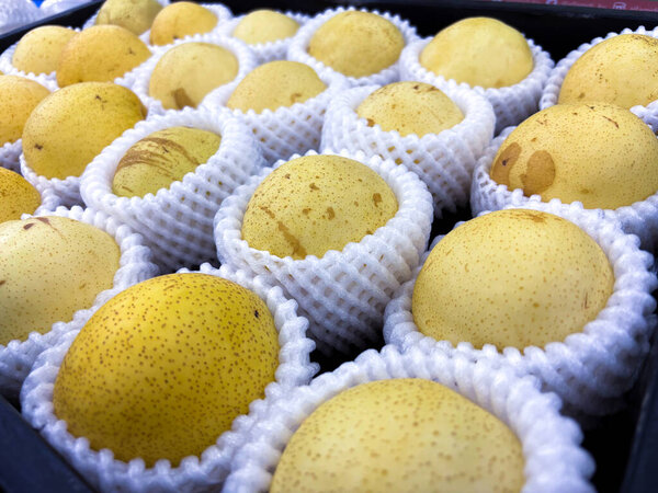 Delight in the sweet taste of fresh Asian pears! Perfect for healthy snacks, desserts, or adding a touch of elegance to any culinary creation.