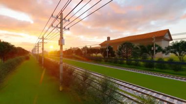 Sabahın erken saatlerinde kırsalda tren rayları var.
