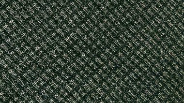 Koyu yeşil örgü örgü tekstil arkaplanı