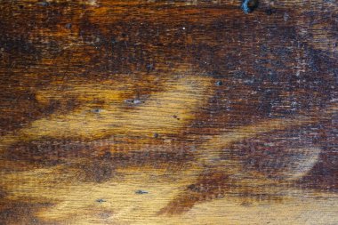 Yıpranmış koyu ahşap kalaslara yakın çekim, zengin tahıllar, çizikler ve tasarım ve arka plan kullanımı için doğal kusurlar..