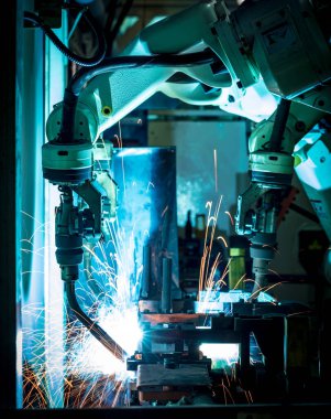 Kaynak robotları otomotiv parçaları endüstrisindeki hareketi temsil ediyor