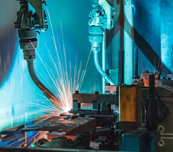 The movement of the robot welding in an auto parts factory.