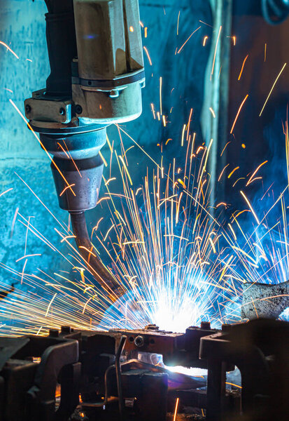 welding robots represent the movement in the automotive parts industry
