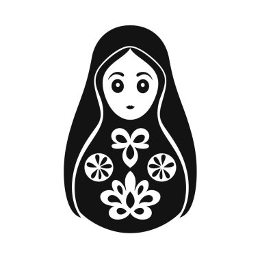 Tarz sahibi, siyah-beyaz bir çizim basit yüz hatları ve çiçek desenli bir matruşka bebeği gösteriyor..