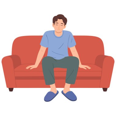  Yorgun adam yorucu bir günün ardından kanepede dinleniyor.