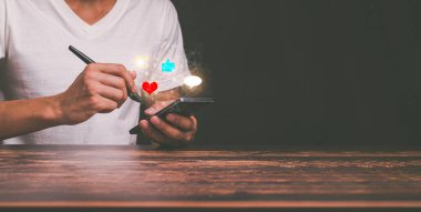 using smart phone with notification icons Socialmedia Marketing concept