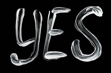 Enerji dolu boya darbeleriyle EVET harfleri çizilmiş. Motivasyon, tercihler, oy kullanma ve başarılı sonuçlar için yaratıcı işaret.