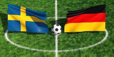 İsveç ve Alman bayraklarının çimenli bir spor sahasında bir futbol topunun üzerinde sallanışının yüksek açılı görüntüsü