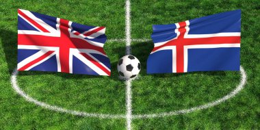 İngiltere ve İzlanda arasında yeşil çimenlik alanda bayraklarla oynanan uluslararası futbol maçı