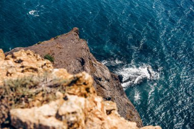 Cape Fiolent in Crimea, view of the Karadeniz and cliff in summer in sunny day