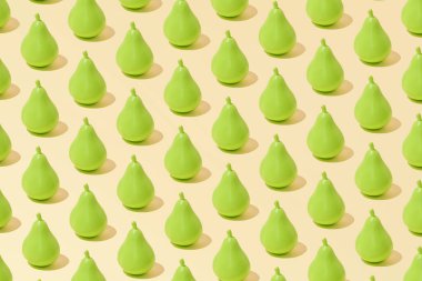 Yaratıcı soyut yaz armut deseni düz Pastel sarı arkaplan minimalizmi üzerine yatıyordu