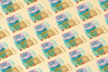 Yaratıcı soyut market sepeti desenleri pastel sarı arkaplan minimalizminin üzerine yatıyordu.