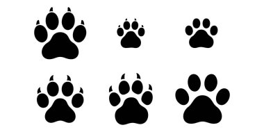 Farklı boyutlarda, beyaz bir arka planda mükemmel bir şekilde izole edilmiş altı siyah pati izi siluetinden oluşan bir koleksiyon..