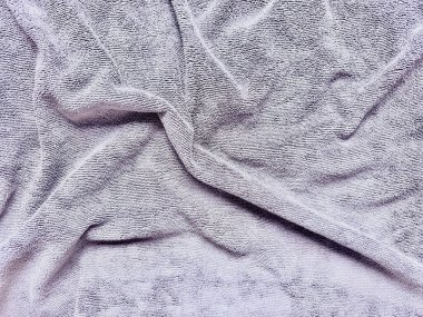 Katlanmış gri havlu, spa markası ve web arkaplanı dokusu
