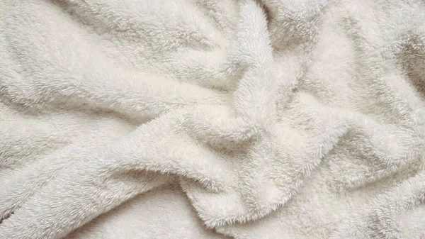 Pofuduk beyaz kabarık, kaplıca markalaşması veya web tasarım arka planı için kumaş dokusu