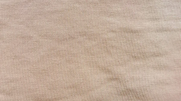 yumuşak bej tırtıklı örgü dokusu yakın plan tarafsız arkaplan, tasarım duvar kağıdı afişi için
