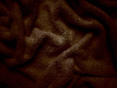 Zengin çikolata kahverengi yün dokusu yumuşak kıvrımlar halinde dalgalanır. Samimi sıcaklığı çağrıştırır. Sonbahar duvar kağıtları için mükemmeldir.