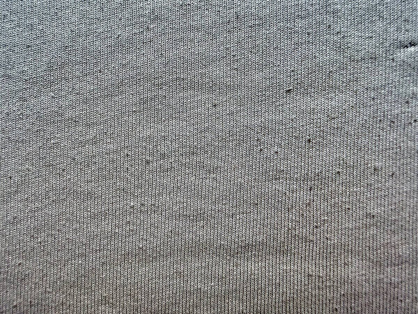 heathered gray ribbed knit fabric macro texture revealing intricate weave and soft mottled blend for cozy apparel designs