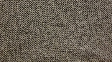 Kahverengi tüvit kumaş dokusu köşegen dokuma deseni ile yakın plan tasarım için kırsal sıcaklık ve toprak derinliği çağrıştırıyor.