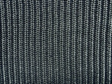siyah beyaz kurdeleli örgü kumaş makro yakın plan karmaşık dikey zigzag iplik dokusu tek renkli desen ortaya çıkarır